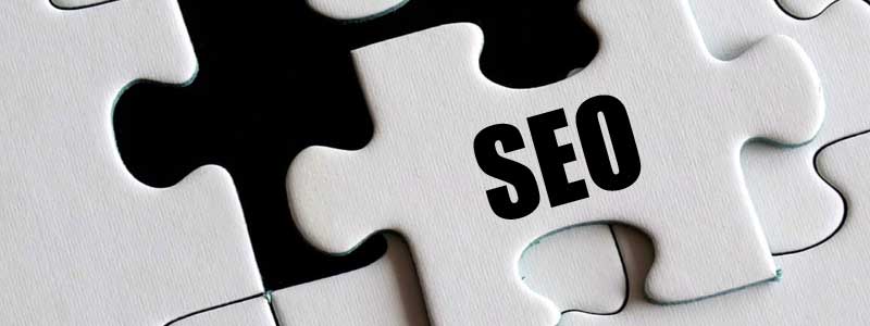 Puzzle Piece With The Word "SEO"